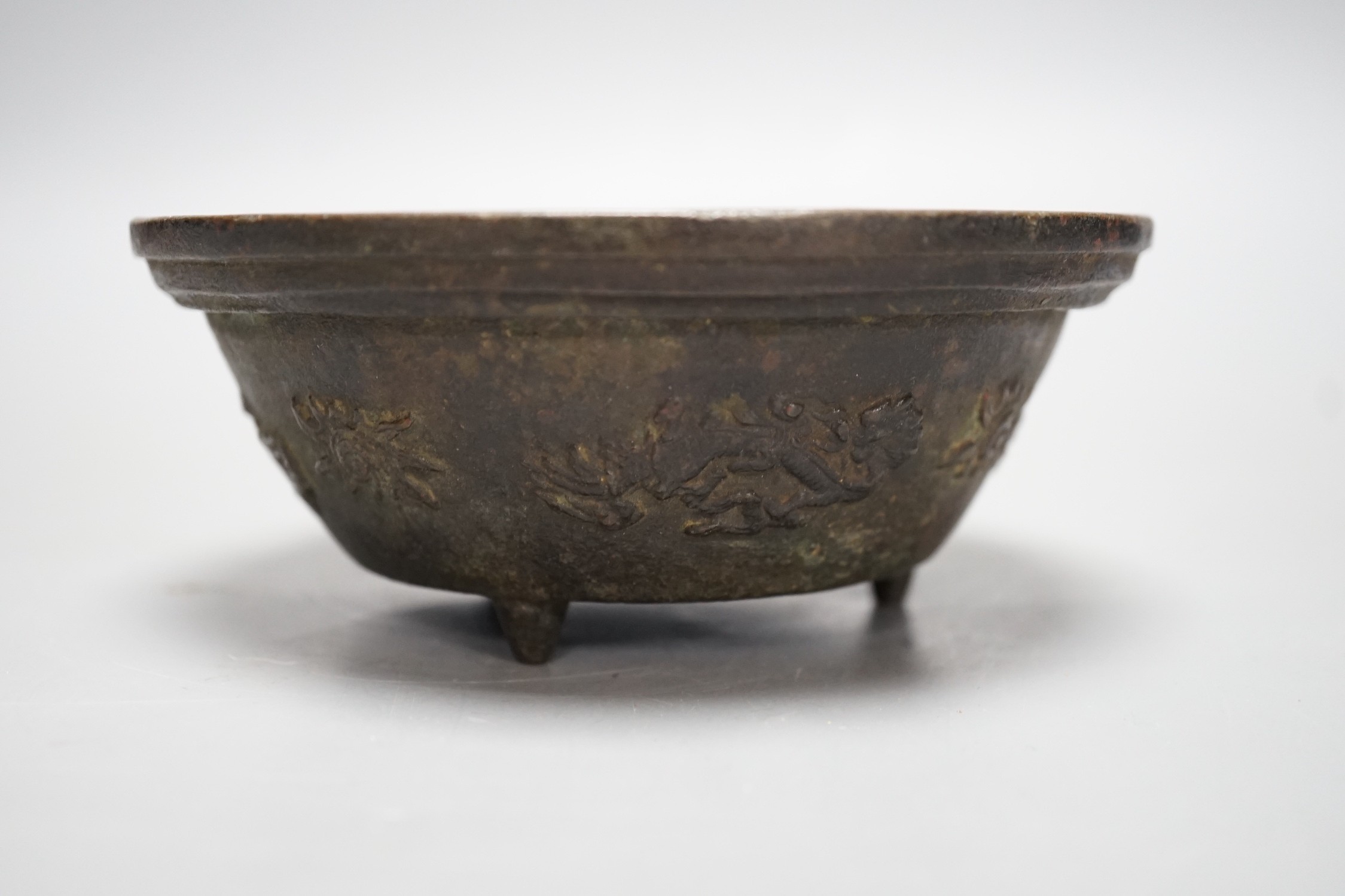 A Chinese bronze bowl, with inscriptions, possibly 18th century, 13.5cm diameter